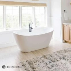 Philo Acrylic Double Slipper Freestanding Tub Package -A&E BATH & SHOWER Shop philo pkg sweetclover.lane lifestyle v2 fhuazqpsm9svptsr