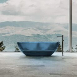 Floki 67 Inch Transparent Double Ended Solid Surface Freestanding Tub - Blue